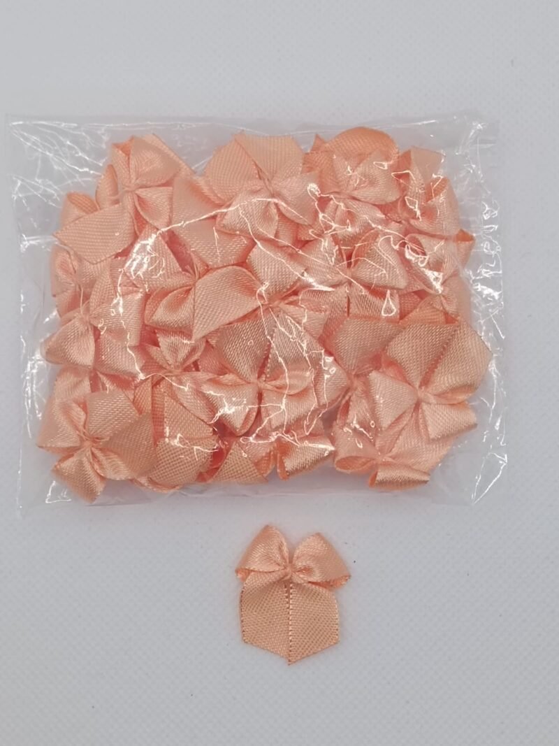 Pacote com múltiplos Laços Gordinho de Cetim na cor Pêssego, ideal para produção em escala de lingeries delicadas e femininas.