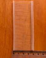 Pino de tag transparente para fixação de etiquetas em roupas e tecidos.