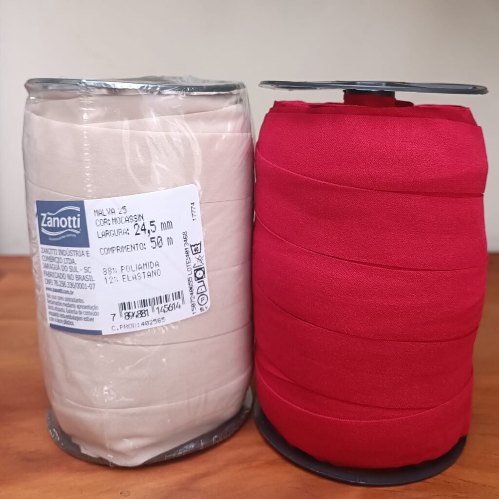Rolo de elástico dobrável Malva 25 na cor mocassim/nude e rolo na cor vermelha, para confecção de lingerie, Evelin Tecidos
